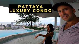 Thai girl shows me luxury condo building in Pattaya, Thailand 