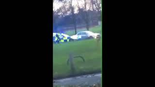 Police stop car in a park in Preston