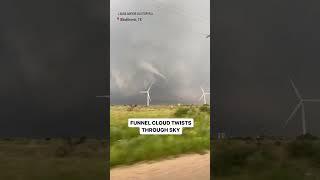 Funnel Cloud Twists Through Sky in North-Central Texas