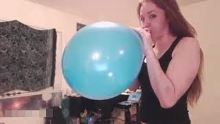 Balloon Girl Blows The Blue Balloon to its Maximum Capacity