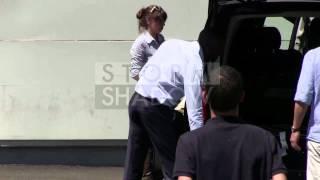 EXCLUSIVE: Natalie Portman carrying boy and husband Benjamin Millepied arriving at Cannes Airport