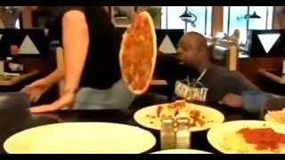 Beetlejuice takes a slice of pizza