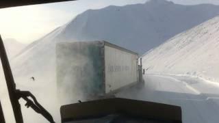 Ice Road Trucker overtakes on Dalton Highway's Atigun Pass