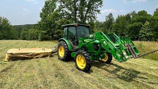 John Deere 5075E & Krone Disc Mower Cutting 1st Cut Hay.