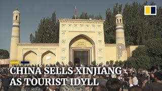 China sells Xinjiang as tourist idyll