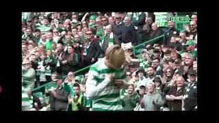 Kyogo points out An Gorta Mór memorial badge on his Celtic shirt during goal celebration