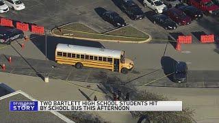 Two Bartlett High School students hit by school bus Friday afternoon.