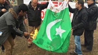 Pakistan flag burnt by  Balochistan leaders in Canada