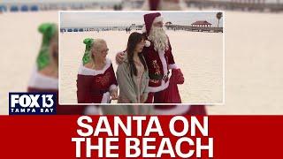 Santa and Mrs. Claus take to the beach in Clearwater to spread Christmas cheer