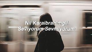 Nil Karaibrahimgil - Seviyorum Sevmiyorum (Lyrics) "var mı şimdi başka biri? onu bana benzettin mi?"