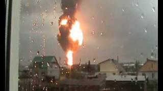 Massive oil tank explosion filmed from 2 km away