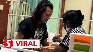 Heartwarming video of woman feeding hospital patient goes viral