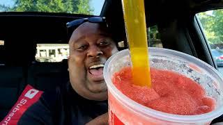 Sipping a Super Big Gulp Size Slurpee Thru a Big Straw in Seconds For National Slurpee Day (7/11)