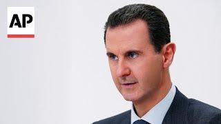 President Assad reported to have fled Syria after rebels entered capital Damascus