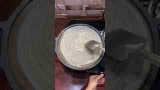 Dosa making in cast iron tawa.