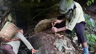 The girl returned to the man's shelter, making a stone trap, a mysterious gift.