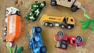 Toy construction vehicle buried under sand and the story of construction vehicle rescued by a crane