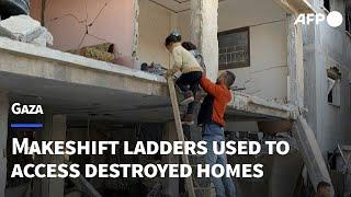 'No choice': Gazans use makeshift ladders to access destroyed homes | AFP