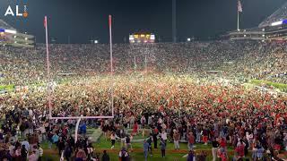 Auburn fans rush the field after Tigers upset No. 15 Texas A&M in 4 overtimes