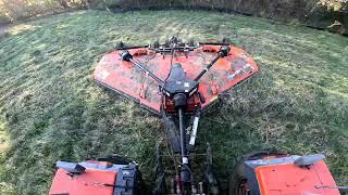 Mowing a section of a field, and clearing under a Tree