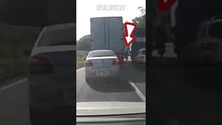 Cyclist Stuck Between Two Trucks