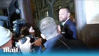 Moment Conor McGregor leaves court after losing rape case