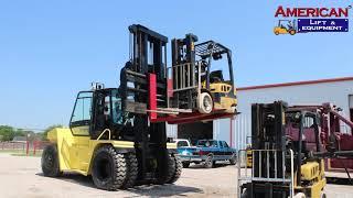 Forklift lifting another Forklift