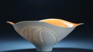 Throwing and trimming porcelain on the potters wheel by Antoinette Badenhorst