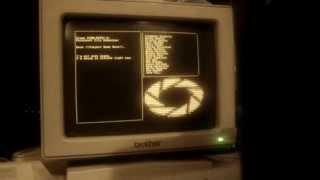 Portal "Still Alive" ending credits on a real amber monochrome monitor