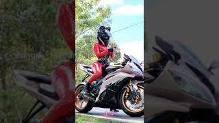 Hot Biker Girl in Red Dress Driving motorcycle close call R15 Royal Enfield