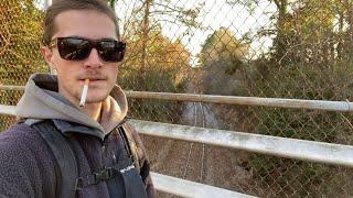 Smoking a Cigarette on a Bridge