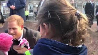 Cute moment Prince Harry compliments kids on high-vis vests