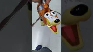 Barking Slinky from Toy Story. with light up mouth .junk store find