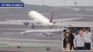 Harrowing footage shows Gonzaga team plane, Delta jet near-miss on LAX runway