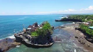 Aerial View of Tanah Lot Temple, Beraban, Kediri, Tabanan Regency, Bali, Indonesia. | Stock Footage