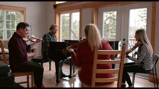 Adam Young performs with Dara Smith MacDonald, Chrissy Crowley, and Colin Grant