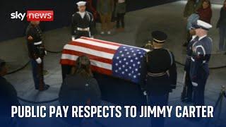 The public pay their respects to former US president Jimmy Carter