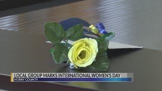 "Zonta MB" group gives yellow roses to women in leadership roles in the Grand Strand