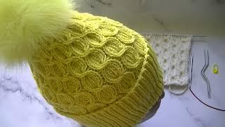 Gorgeous hat with beautiful braids with needles