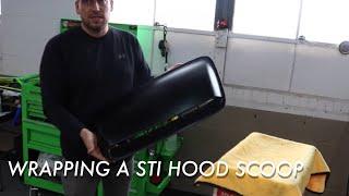 Wrapping a  Subaru STI Hood Scoop in 3M 2080 Satin Black