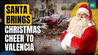 Santa brings Christmas cheer to Valencia following devastating October floods | N18G