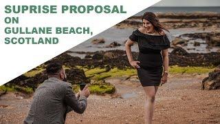 Edinburgh engagement photoshoot with beach surprise proposal