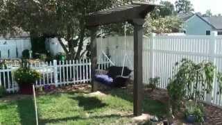 Pergola / Arbor garden swing - wicker & wood