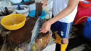 Mackerel 2 fish cutting skills by a 20 years experience the  person,in Cecil wet market  Penang