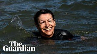 Paris mayor swims in the Seine to show it's clean enough for Olympic swimming events