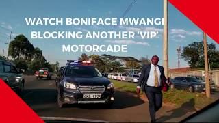 Activist Boniface Mwangi blocks VIP motorcade on Langata road