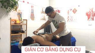 Giãn Cơ Bằng Dụng Cụ