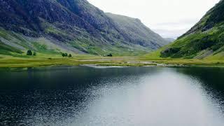 A Clouds View - Aerial Drone Shot of Glen Coe's Loch Achtriochtan | 4k Drone Footage Scotland