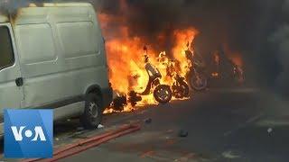 Tear Gas and Motorcycles on Fire at 'Yellow Vests' Protest in Paris