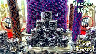 Quite possibly the world’s largest poker chip tower inside a high limit coin pusher